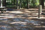 This is a small site, ideal for a tent or pop up unit. Water, electric, and sewer hook ups provided.