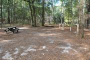 This site includes water, septic, and electric.  Accommodates tents, pop ups and RV's.