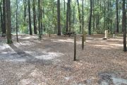 This site includes water, septic, and electric.  Accommodates tents, pop ups and RV's.