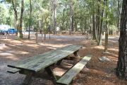 This site includes water, septic, and electric.  Accommodates tents, pop ups and RV's.