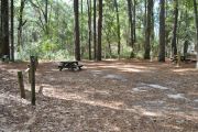This site includes water, septic, and electric.  Accommodates tents, pop ups and RV's.