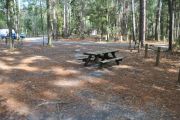 This site includes water, septic, and electric.  Accommodates tents, pop ups and RV's.