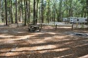 This site includes water, septic, and electric.  Accommodates tents, pop ups and RV's.
