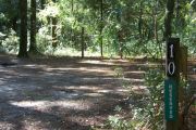This site includes water, septic, and electric.  Accommodates tents, pop ups and RV's.