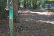 This site includes water, septic, and electric.  Accommodates tents, pop ups and RV's.