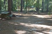 This site includes water, septic, and electric.  Accommodates tents, pop ups and RV's.