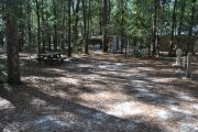 This site includes water, septic, and electric.  Accommodates tents, pop ups and RV's.