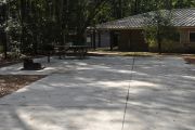 This site is ADA equipped.  Paved with a standing grill. Water, electric, and sewer hook ups provided.