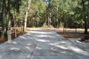 This site is ADA equipped.  Paved with a standing grill. Water, electric, and sewer hook ups provided.