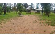 Campsite with picnic table.