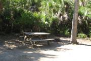 Each site is equipped with a picnic table, lantern post, hose bib, electric hook-up for 20 and 30 amp service, and fire pit on the ground with a fold over grill top.