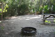 Each site is equipped with a picnic table, lantern post, hose bib, electric hook-up for 20 and 30 amp service, and fire pit on the ground with a fold over grill top.
