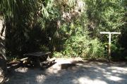 Each site is equipped with a picnic table, lantern post, hose bib, electric hook-up for 20 and 30 amp service, and fire pit on the ground with a fold over grill top.