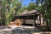 Cabin #1 at Blue Spring State Park from the outside showing the screened in porch.