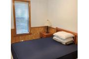 Cabin #4 at Blue Spring State Park showing a bedroom with one double bed. Cabin #4 at Blue Spring State Park showing a bedroom with one double bed.