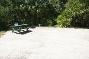 Campsite #16 at Blue Spring State Park showing picnic table and fire ring.
