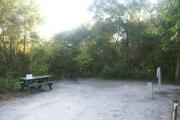 Campsite #27 at Blue Spring State Park showing picnic table and fire ring.