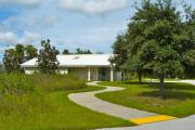 A paved walkway close by camps site 1 leading to the full facility bathrooms and laundry area.