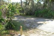 Looking at campsite marker #15; site partially shaded in afternoon