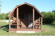 Photo: 005, PRIM. Cabin #5 at Oleta River has a porch swing.