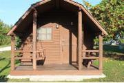 Photo: 008, PRIM. Cabin #8 at Oleta River has a porch swing.