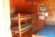 Photo: 008, PRIM. Cabin #8 at Oleta River has a set of bunk beds and a double bed.