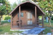Photo: 011, PRIM. Cabin #11 at Oleta River has a porch swing and a picnic table.
