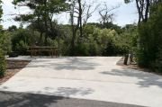 ADA-Accessible site with concrete pad. RVs only.
