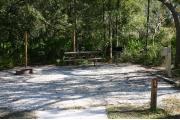 This site has a standing grill, fire ring, picnic table, water, and electric 20/30/50 amp. Amenities include a camp store, recreation hall, ADA accessible showers and restrooms, laundry, dump station, canoe rentals, short walk to the river, and playground. This is a tent only site with a fine gravel surface. There is no vehicle parking on this site.