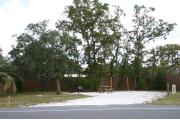 This site has a standing grill, fire ring, picnic table, water, electric 20/30/50 amp, and sewer. Amenities include a camp store, recreation hall, ADA accessible showers and restrooms, laundry, dump station, canoe rentals, short walk to the river, and playground. Tents and RV (maximum length of 40 ft) are allowed. This site is fine gravel surface.