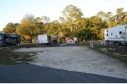 This site has a standing grill, fire ring, picnic table, water, electric 20/30/50 amp, and sewer. Amenities include a camp store, recreation hall, ADA accessible showers and restrooms, laundry, dump station, canoe rentals, short walk to the river, and playground. Tents and RV (maximum length of 40 ft) are allowed. This site is fine gravel surface.