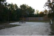 This site has a standing grill, fire ring, picnic table, water, electric 20/30/50 amp, and sewer. Amenities include a camp store, recreation hall, ADA accessible showers and restrooms, laundry, dump station, canoe rentals, short walk to the river, and playground. Tents and RV (maximum length of 40 ft) are allowed. This site is fine gravel surface.