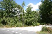 This site has a standing grill, fire ring, picnic table, water, electric 20/30/50 amp, and sewer. Amenities include a camp store, recreation hall, ADA accessible showers and restrooms, laundry, dump station, canoe rentals, short walk to the river, and playground. Tents and RV (maximum length of 40 ft) are allowed. This site is fine gravel surface.
