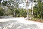 This site has a standing grill, fire ring, picnic table, water, electric 20/30/50 amp, and sewer. Amenities include a camp store, rec hall, ADA accessible showers and restrooms, laundry, dump station, canoe rentals, short walk to river, and playground. This is a pull through site for RVÃ¢ÂÂs only; Maximum length of 40 ft. This site is fine gravel surface.