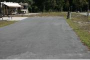 This site has a standing grill, fire ring, picnic table, water, electric 20/30/50 amp, and sewer. Amenities include a campground store, recreation hall, ADA accessible showers and restrooms, laundry, dump station, canoe rentals, short walk to the river, and playground. Maximum RV length is 40 ft. This is a paved ADA accessible site.