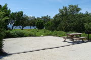 Photo: 007, View looking out from back of site to beach. Atlantic Ocean in background.