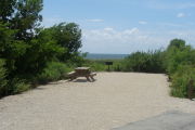 Photo: 017, View looking from front of site to beach, picnic table, grill and Atlantic Ocean in background.