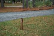 A view of RV site twenty-eight at Topsail Hill Preserve State Park showing the site marker next to the site.