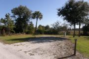 Campsite 21 has little shade and is nestled between a depression marsh, Military Trail, and the horse paddocks. The vehicle pad and entrance are wide.