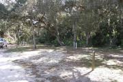 Campsite 26 is easy for the novice RVer to back their camper unit into. The oak limbs are high above the site and the vehicle pad is wide.
