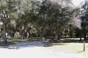 Campsite 34 has a wide vehicle pad and entrance. Oak trees provide shade for most of the site.
