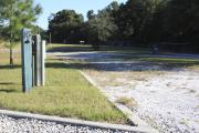 Photo: 16, Loop C. View of campsite with electric hookup.