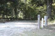 Photo: 016, SANTOS CAMPGROUND. View of campsite with water and electric hookups and picnic table with fire ring.